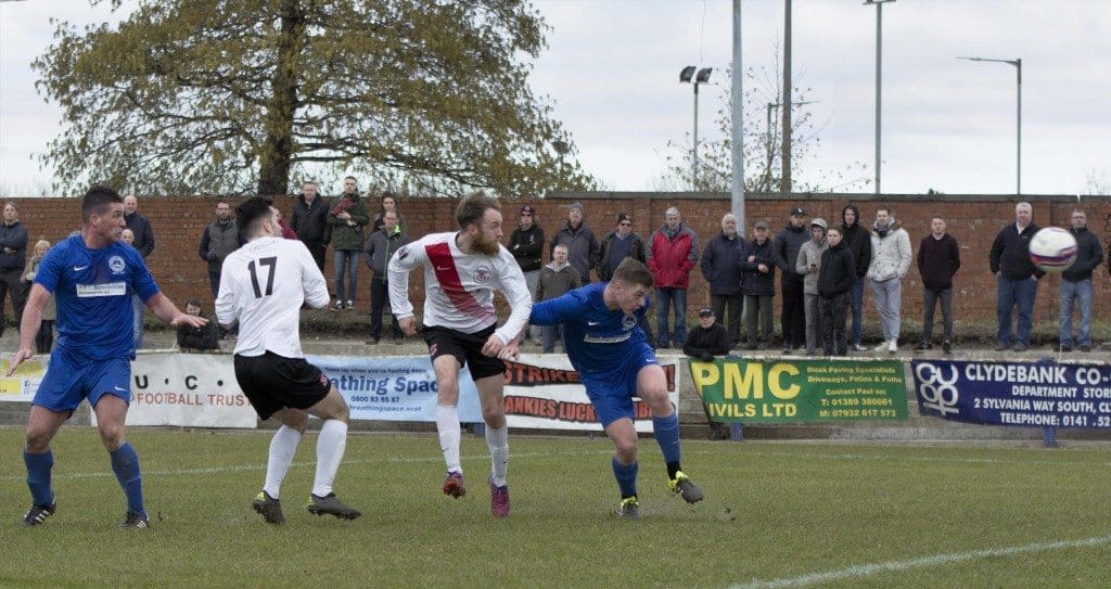 Ryan Holms grabs his brace