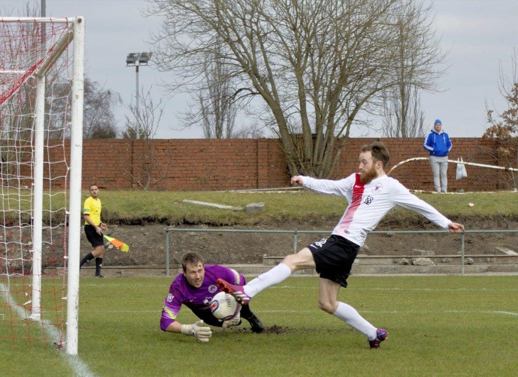 Ryan Holms pounces to open the scoring